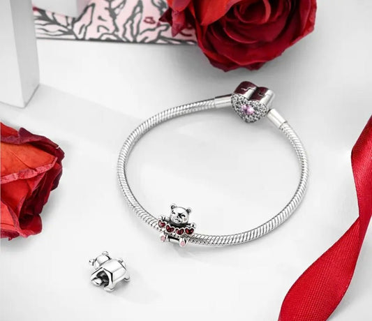 Sterling Silver Bear With String Of Hearts - Enchanting Charms