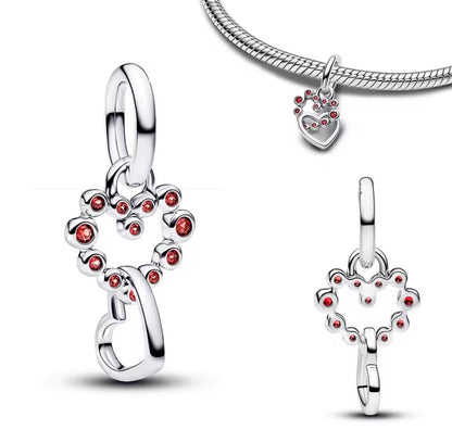Sterling Silver Red Stone Connected Hearts Charm - Enchanting Charms